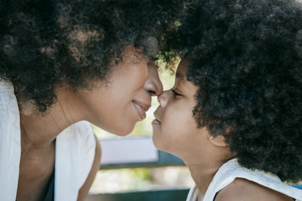 mother in her 40s with child